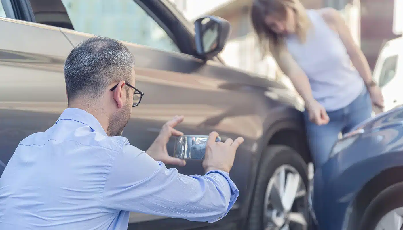 photographing car after a traffic accident